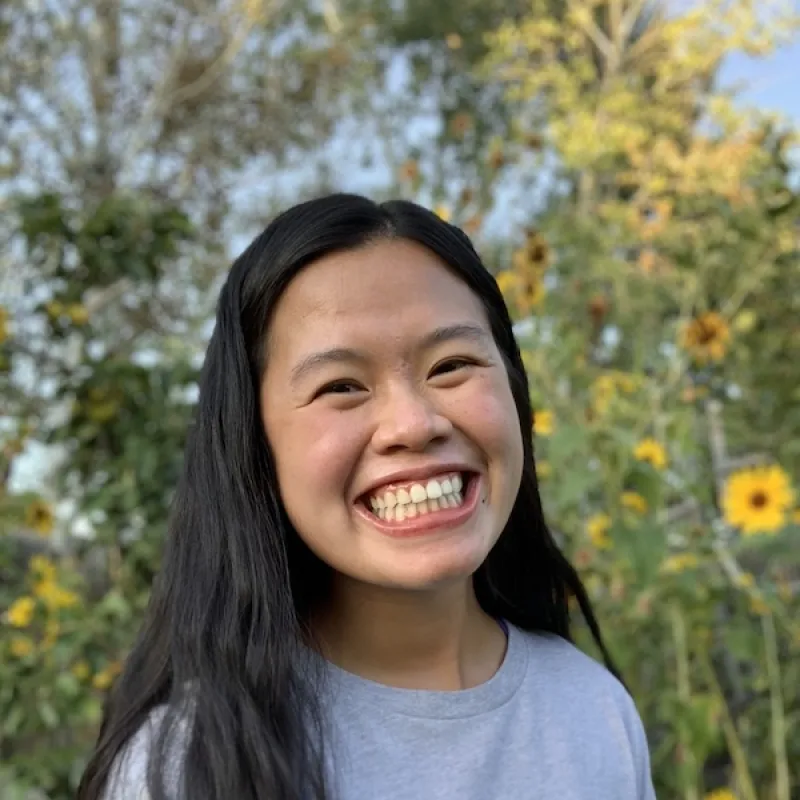 Portrait of Julianne Liu, wearing a light shirt.